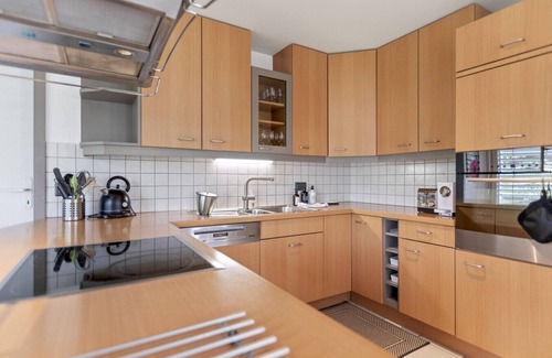 Domdidier House | Bright architect-designed villa with private garden