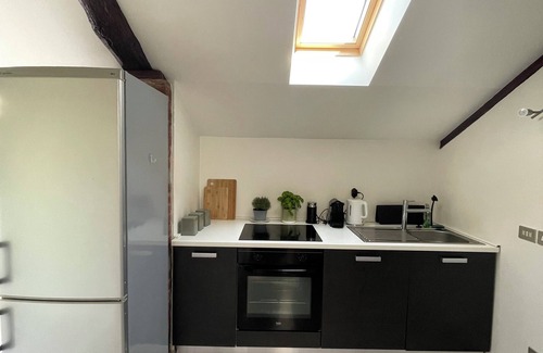 Asti Apartment | Bright attic apartment with balcony in the center of Asti