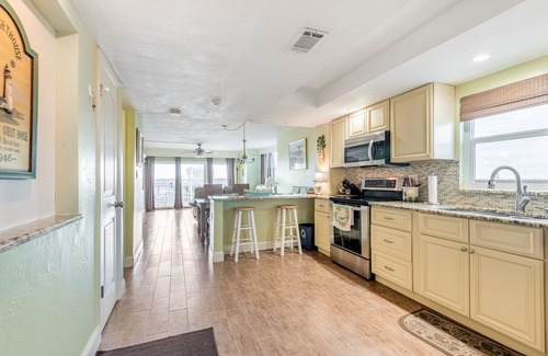 New Smyrna Beach Condo | Bright & Cozy Poolside Retreat in Oceanfront New Smyrna Beach Condo!
