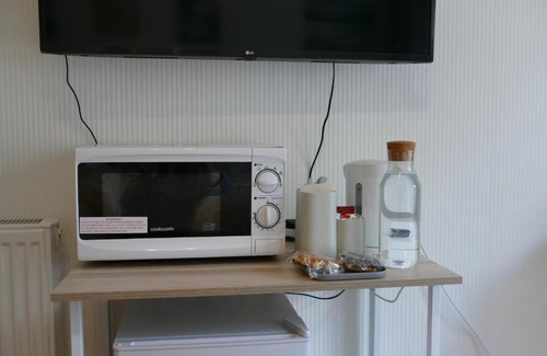 Stafford House | Bright double room with canal view and private patio, entrance and parking