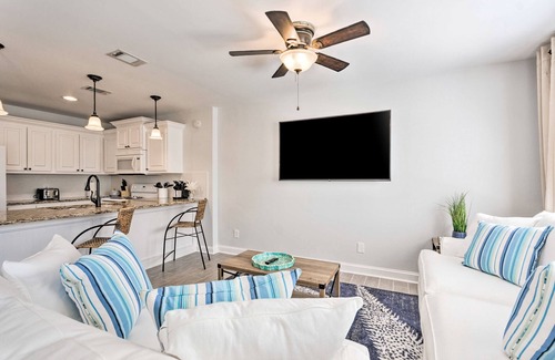 Holiday Isle Condo | Bright, ground-floor condo with patio and near white sand beach