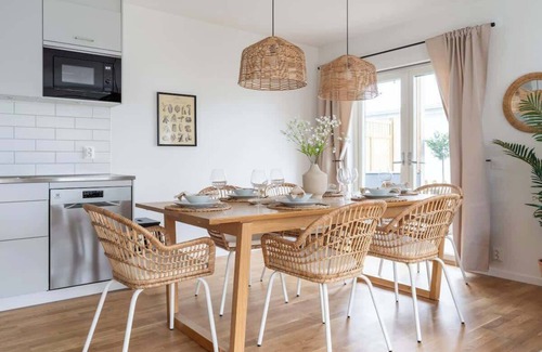 Bastad Condo | Bright Ground Floor Corner Home with Cozy Outdoor