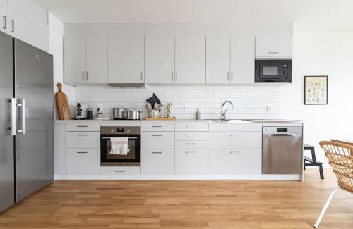 Bastad House | Bright Ground Floor Corner Home with Cozy Outdoor