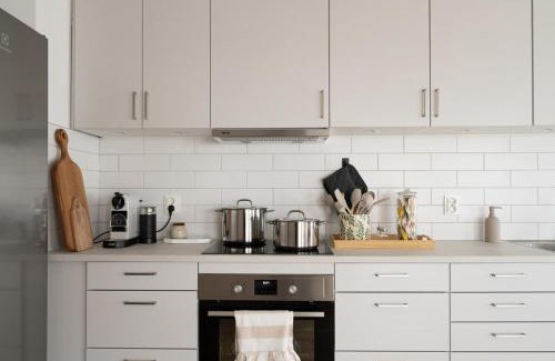 Bastad House | Bright Ground Floor Corner Home with Cozy Outdoor