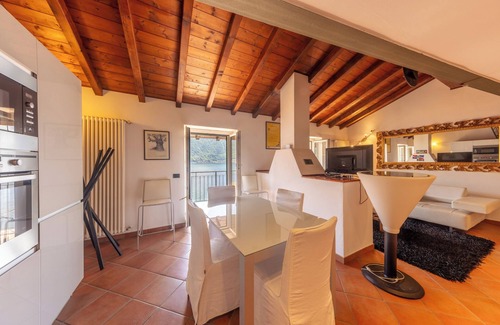 Colonno Apartment | Bright penthouse on Lake Como with breathtaking view.
