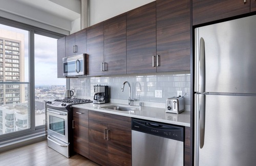 Civic Center Apartment | Bright Soma 2BR w/Theater & Basketball, nr Tech Companies, by Blueground