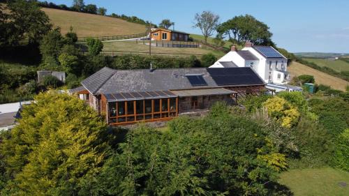 Llanybri House | Brofallen- Spacious pet friendly bungalow with amazing coastal views