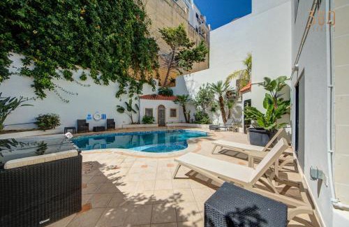 Tal-Ghoqod Villa | Bungalow home with Stunning Pool Area in St'Julians By 360 Estates