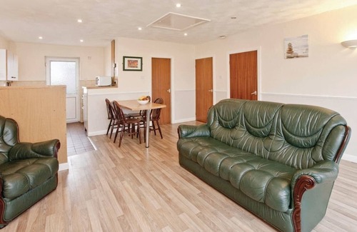 Trearddur Bay Cottage | Bungalow with one double with wash basin, one double and one twin.