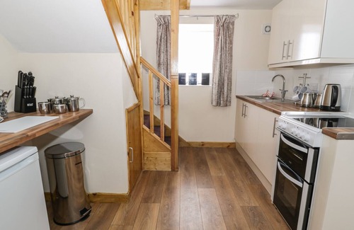 Nerquis Cottage | BUTCHERS ARMS COTTAGE, pet friendly in Nercwys