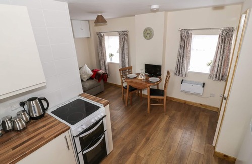 Nerquis Cottage | BUTCHERS ARMS COTTAGE, pet friendly in Nercwys
