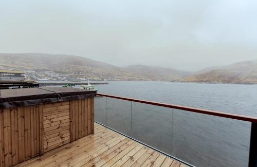 Vestmanna House | By The Sea - Boathouse with Hot Tub & Parking
