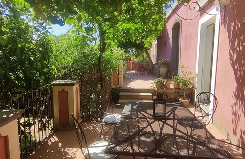 Sant'Anna Apartment | By the sea, large terrace enjoying fantastic views of Etna, shared pool