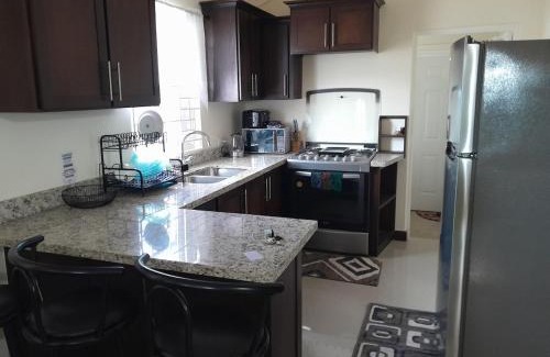 Old Harbour House | C & J's Coco Manor Vacation Home
