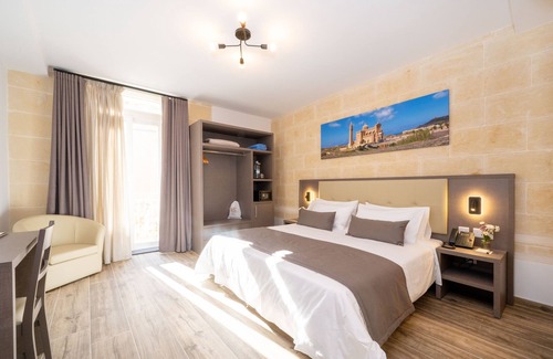 Ggantija House | C4 Retreats by Georges Boutique Living