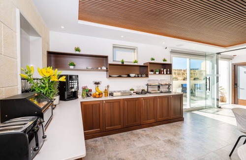 Ggantija House | C4 Retreats by Georges Boutique Living