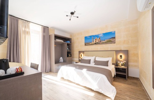 Ggantija House | C4 Retreats by Georges Boutique Living