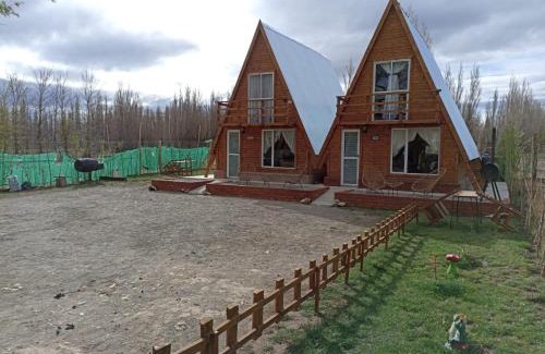 Perito Moreno House | Cabañas alpinas alumine