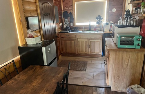 Riverbend Cabin | Cabin, river access, rafts, 1 bedroom and Wi-Fi, AC, Satellite T.V., Kitchen.