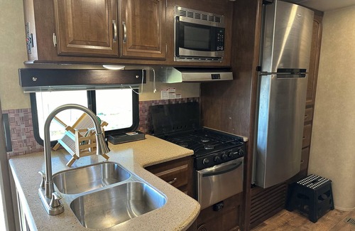 Ruffin RV Rental | Campsite #1 Cozy RV in Lovely St. George with AC, WiFi