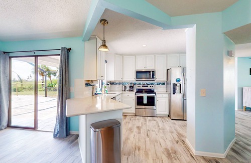 Pebble Beach House | Canal-front home with private pool, grill, patio, AC, W/D & gorgeous views