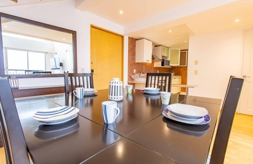 El Yaqui Condo | Capitalia - Bright & Modern Duplex