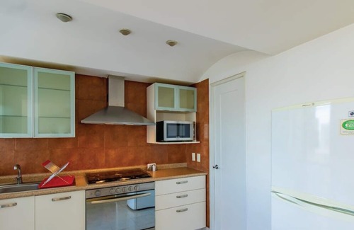 El Yaqui Condo | Capitalia - Sunny & Spacious Near Santa Fe Mall
