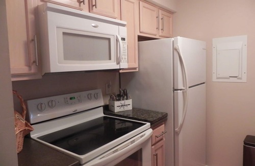 East Bank Condo | Captain's Quarters Riverfront #1