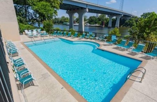 East Bank Condo | Captain's Quarters Riverfront #1