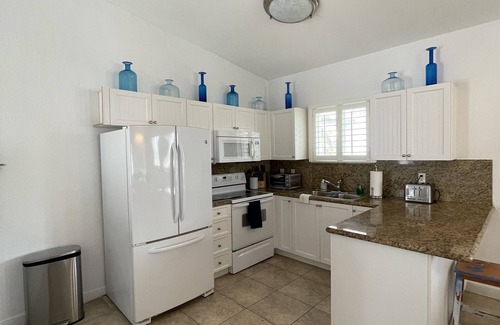 Alice Town Condo | Casa Azul welcomes you to a stunning ocean view condo steps away from the beach