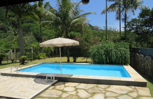 Maresias House | Casa da Josie em Maresias com piscina no pé da Mata Atlântica - 4 quartos