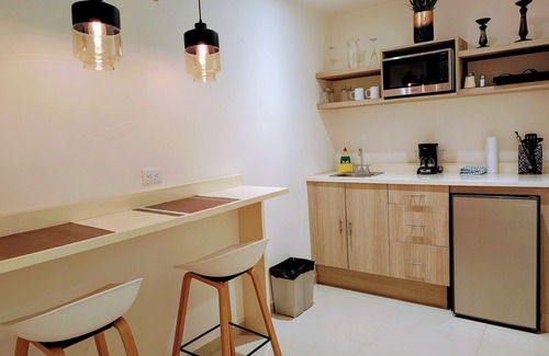 Historic Center Apartment | Casa Donceles Studio with King Bed, Kitchenette, Complimentary baggage storage.