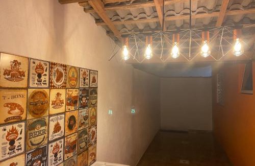 Indaia Apartment | Casa em Bertioga condomínio 200 metros da praia