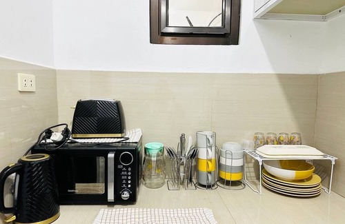 Lipa House | Casa Mercado IV is a cosy 2 storey furnished family-friendly house.n