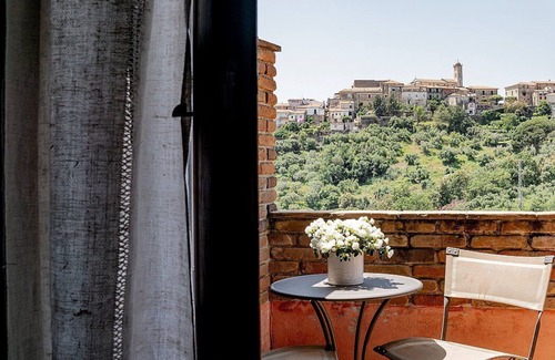 Casal Velino House | Casa Rosamunda A: A graceful apartment that is part of a villa surrounded by the greenery, with Free WI-FI.