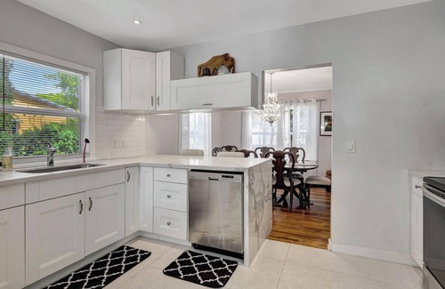Northwood Shores House | Casa Vabin: Lap Pool, Modern "Old Florida" Charm