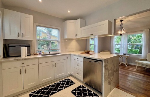 Northwood Shores House | Casa Vabin: Lap Pool, Modern "Old Florida" Charm