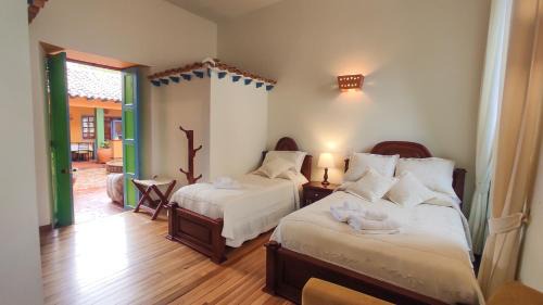 Raquira Hotel | Casona 1865