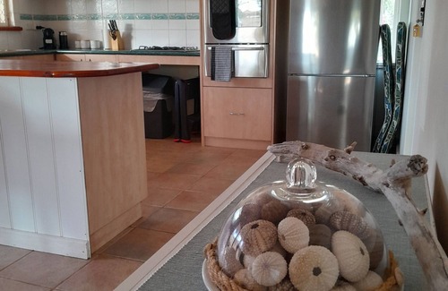 Beachlands House | Central, 2 minute drive to beaches, town and hospital.