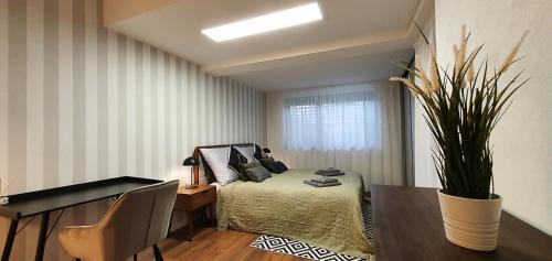 Levice Apartment | Central garden residence