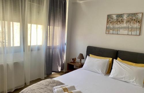 Edessa Apartment | Central & Riverfront Room 3