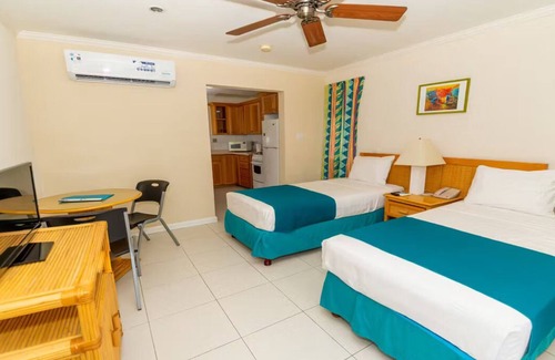 Blue Waters Hotel | Centrally Located near Rockley; Pool, Free WiFi - Fully Equipped Kitchen