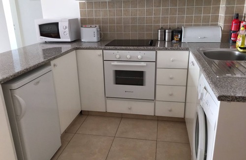 Peyia Town Apartment | centre of Peyia village, 2 Bedrooms, communal Pool, Patio/garden, BBQ free wifi
