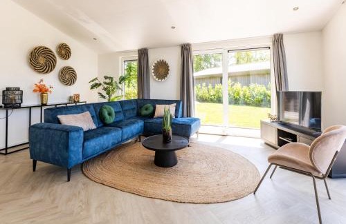 Municipality of Veldhoven Ski Chalet | Chalet by Pond in Holiday Park