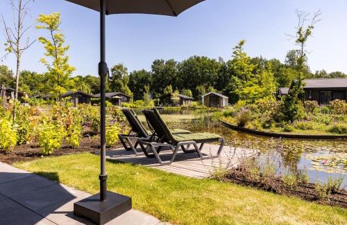 Municipality of Veldhoven Ski Chalet | Chalet by Pond in Holiday Park