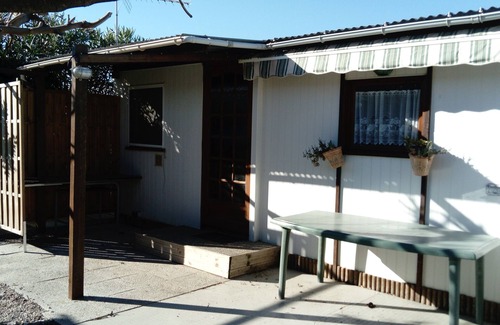 Sigean Ski Chalet | Chalet in campingWell placed quietly, next to the pool, beautiful terrace in the shade