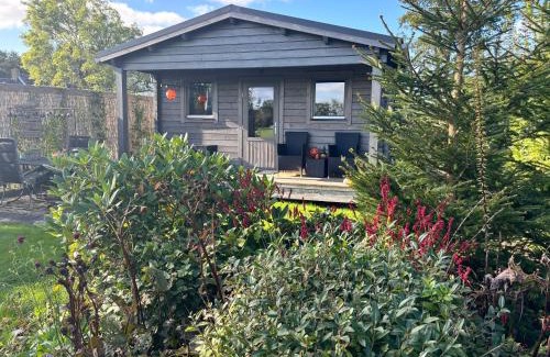 Drachtstercompagnie Ski Chalet | Chalet in het groen met airco