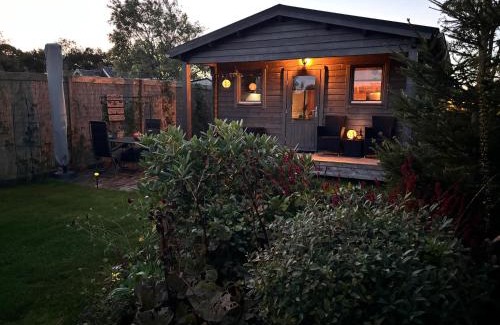 Drachtstercompagnie Ski Chalet | Chalet in het groen met airco