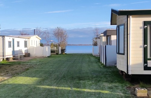 Dijken Ski Chalet | Chalet nabij het water in Langweer