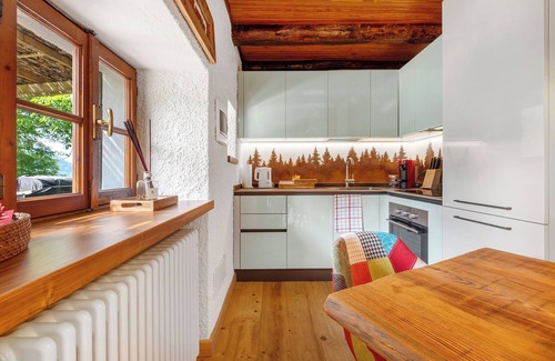 Schignano Ski Chalet | Chalet 'Nini's Home' with Private Terrace, Private Garden and Wi-Fi